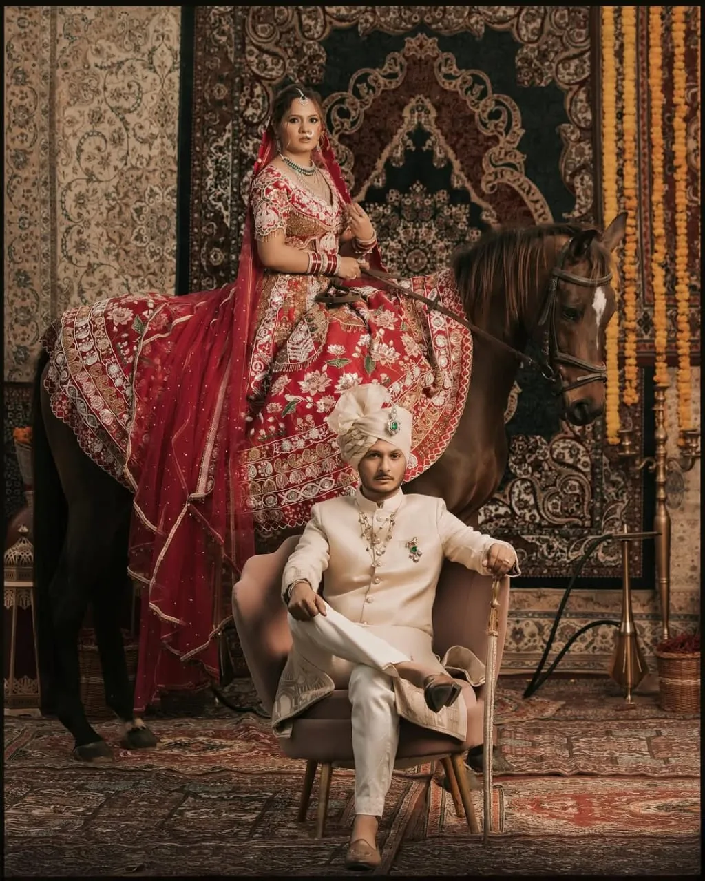 A bride alone on a white horse, draped in red embroidery, dappled light through trees.